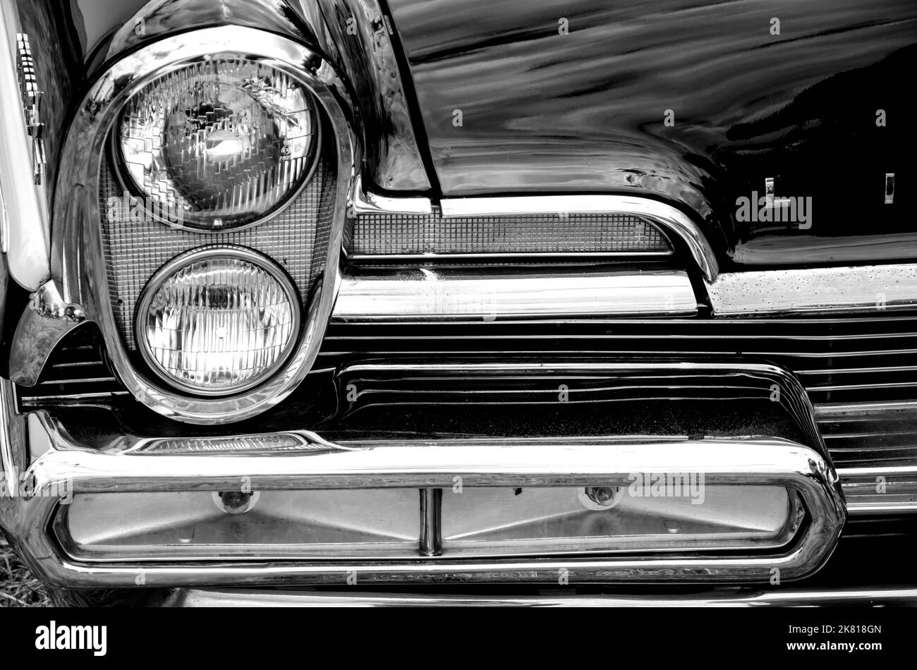 Headlight and front end detail of a 1957 Lincoln Continental (black and white image) Stock Photo