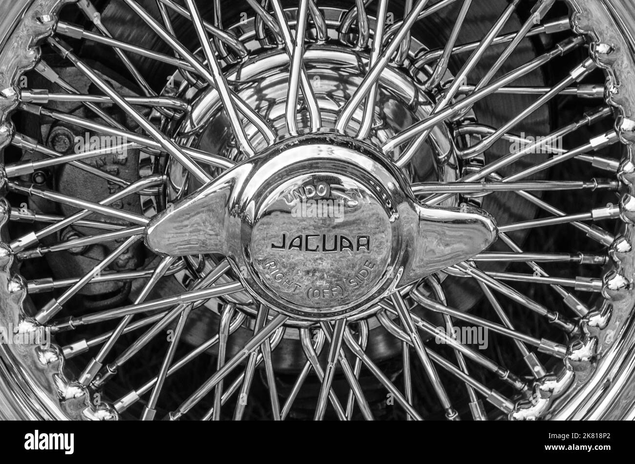 Chrome plated wire spoked wheel (right or off side) on a Jaguar Stock