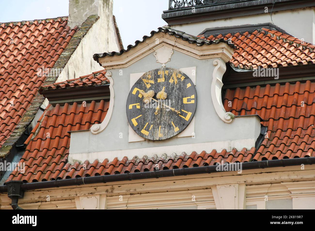 PRAGUE, CZECH - APRIL 24, 2012: This is a historical clock on the Jewish Town Hall with reverse arrows and letters of the Hebrew alphabet instead of n Stock Photo