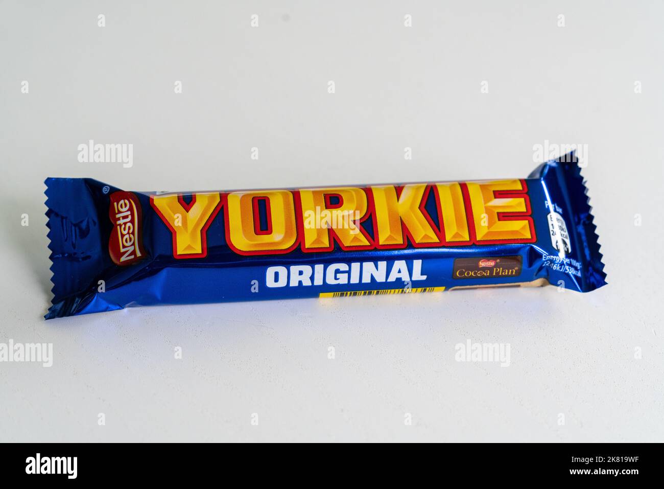 A Yorkie Original chocolate bar made by the Nestle Corporation pictured on plain background in October 2022 Stock Photo