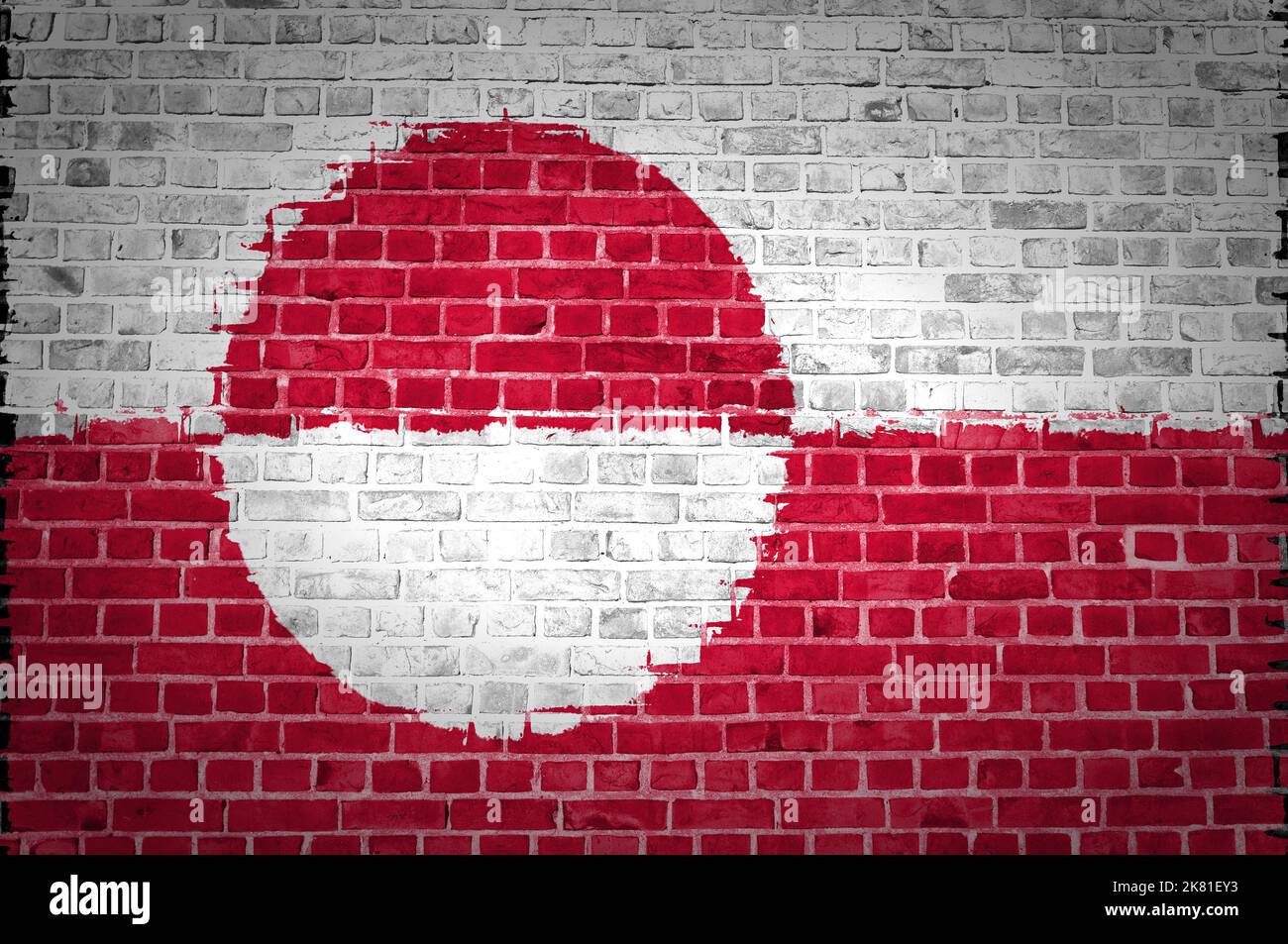 An image of the Greenland flag painted on a brick wall in an urban ...