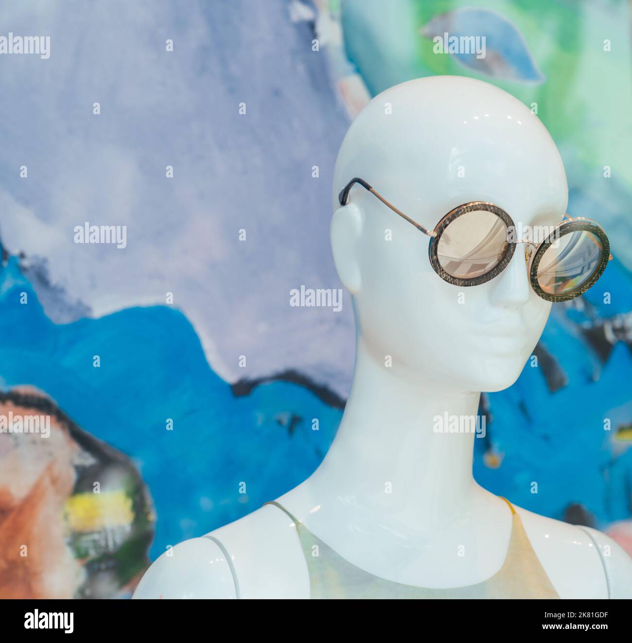 A white male wearing wrap around sunglasses has a image of a marina  reflected in the glasses Stock Photo - Alamy