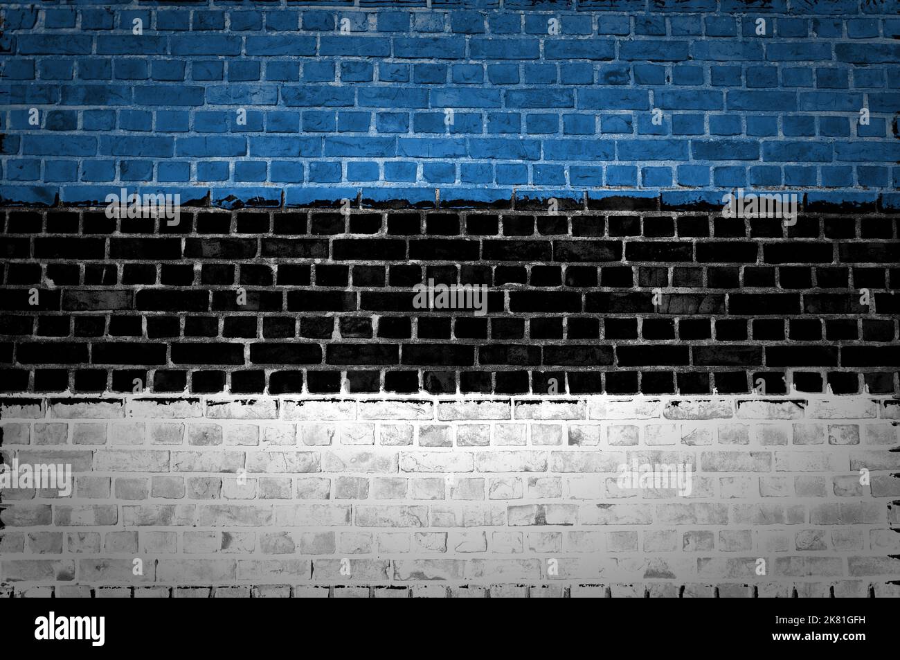 An image of the Estonia flag painted on a brick wall in an urban ...