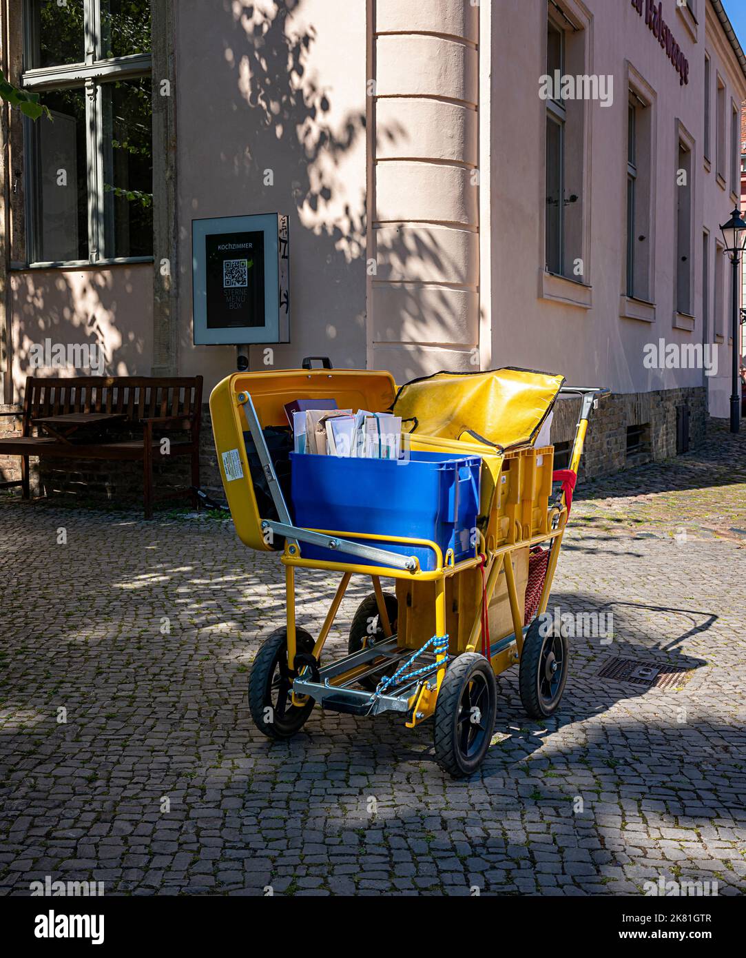 Yellow Cart Of A Letter Carrier, Potsdam, Brandenburg , Germany Stock Photo