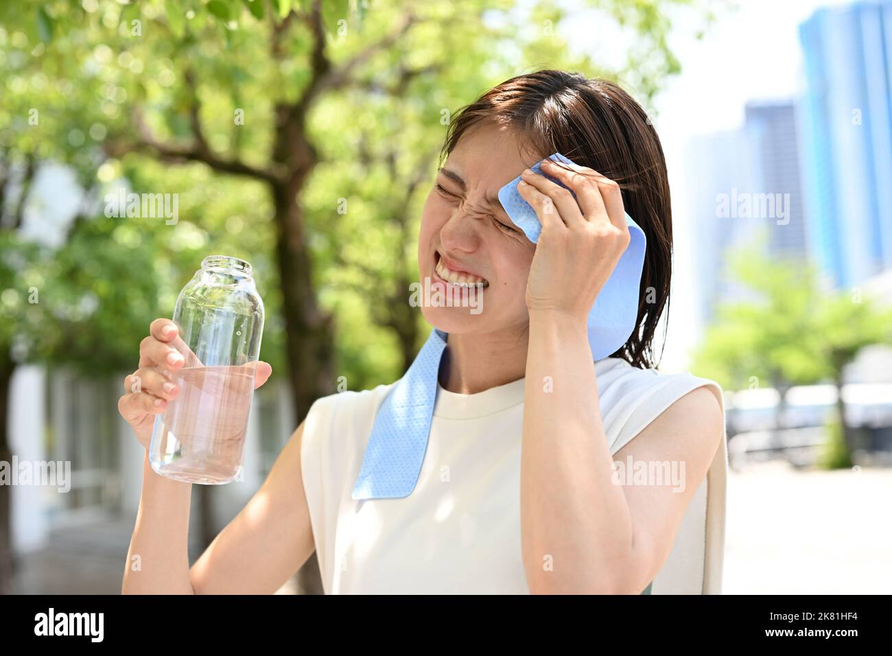 Japanese woman drinking water Stock Photo Alamy