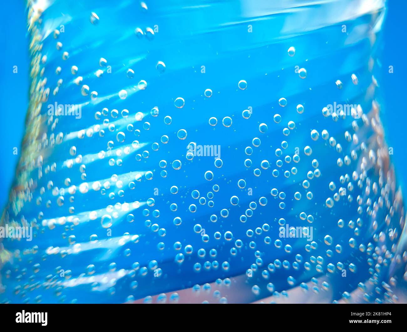 Bottle with fizzy water bubbles Stock Photo Alamy