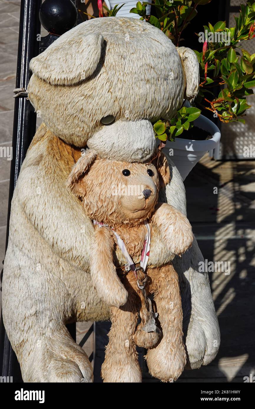 Stuffed animals are hung up in front of houses in Albania as protection against evil, Ksamil, Republic of Albania Stock Photo