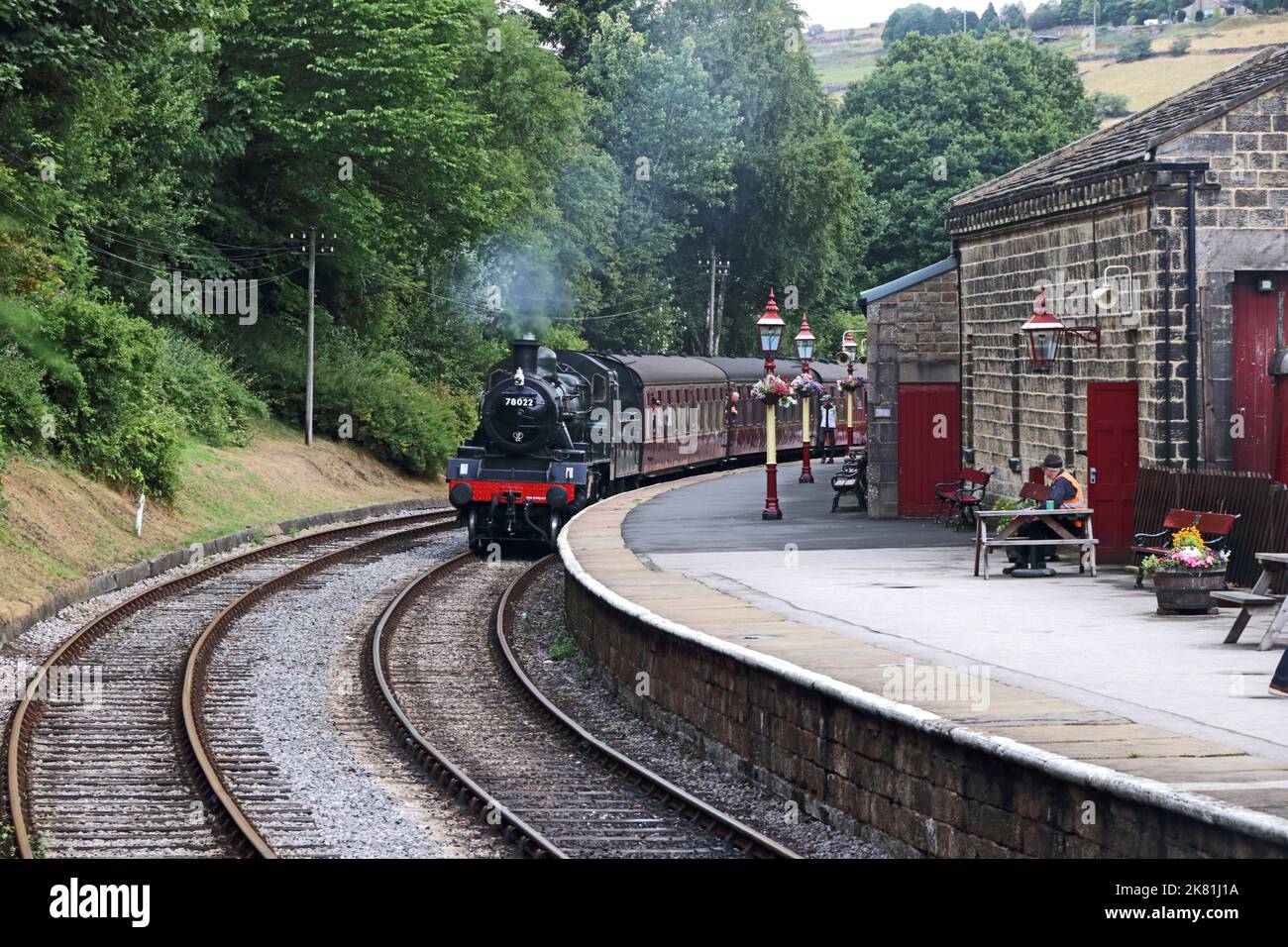 BR Standard Class 2MT 78022 steam train arriving at Oxenhope station on Keighley & Worth Valley Railway Stock Photo