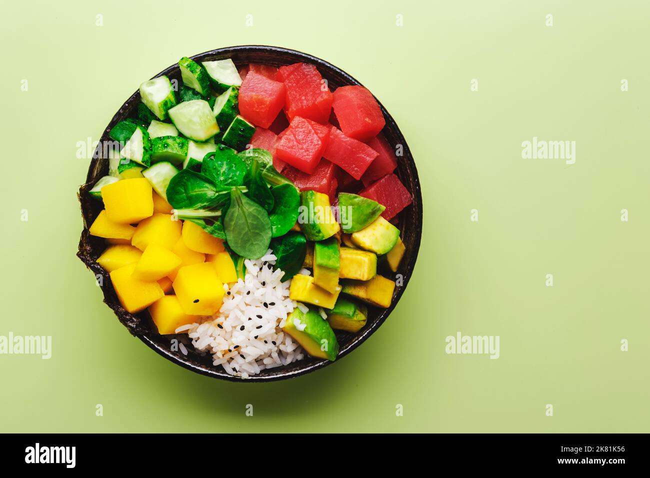 Hawaiian poke bowl with tuna, avocado, mango, cucumber, lamb lettuce ...