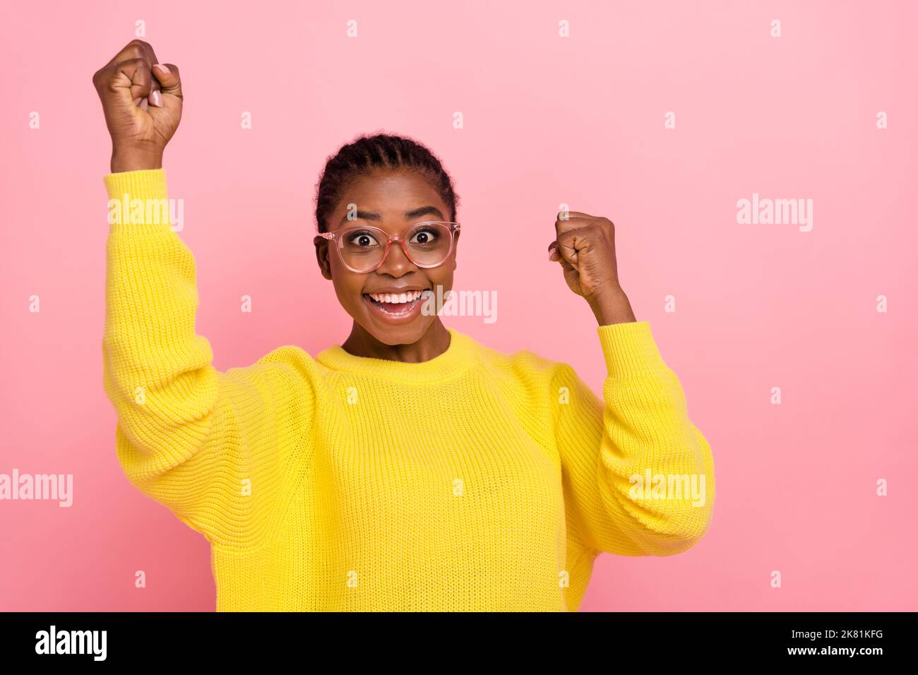 Photo of overjoyed delighted lady raise fists success achievement