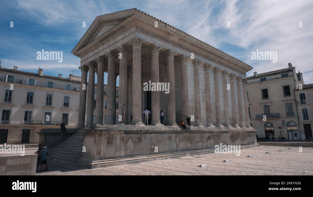 Maison Carrée temple in Nimes, South France. Spring sunny day in Nimes. Stock Photo