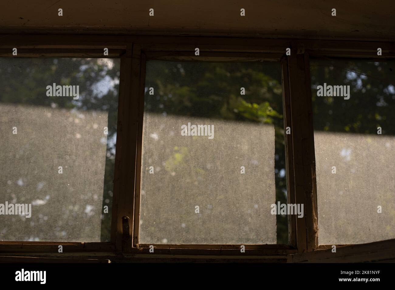 Dust on window. Glass on balcony. Dust layer in sunlight. Interior
