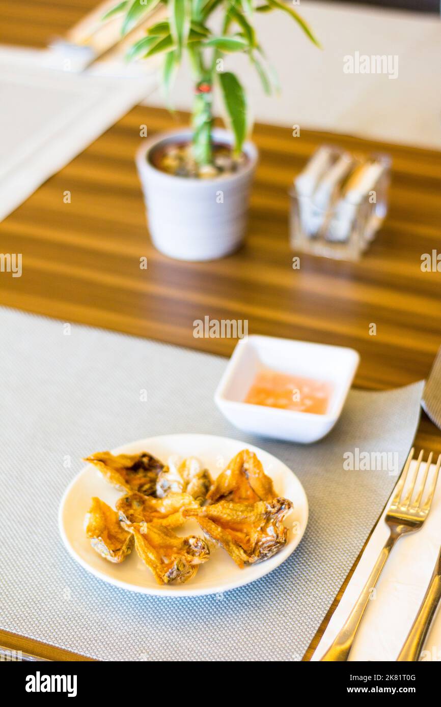Crispy fried dried fish for breakfast at a local hotel restaurant in Bicol, Philippines Stock Photo