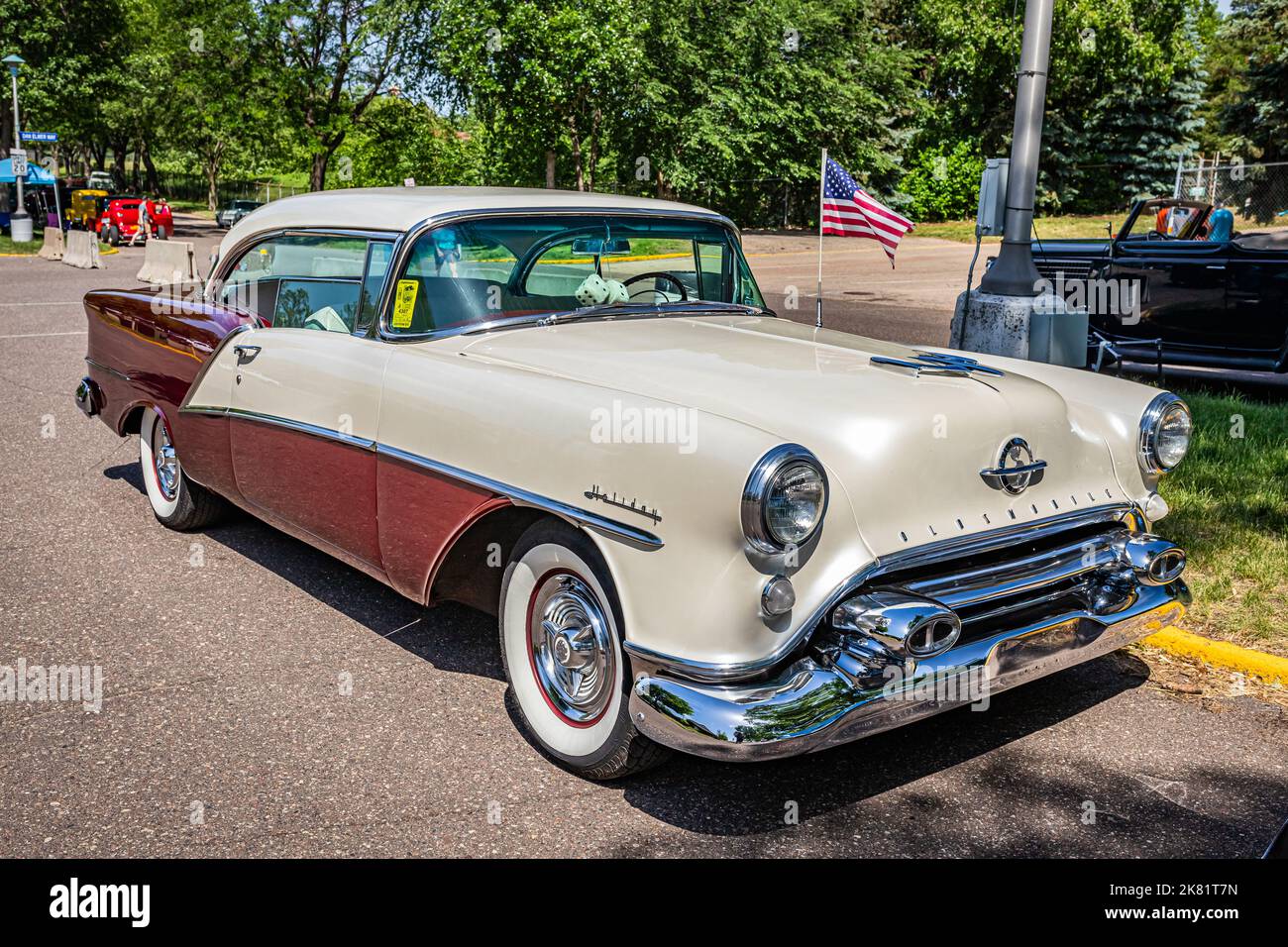 Falcon Heights, MN - June 19, 2022: High perspective front corner view of a 1954 Oldsmobile 98 Holiday Hardtop Coupe at a local car show. Stock Photo