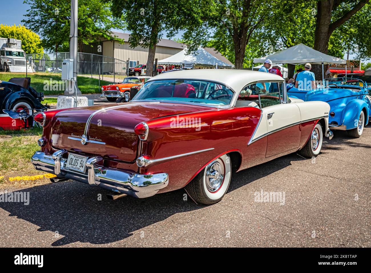 Falcon Heights, MN - June 19, 2022: High perspective rear corner view of a 1954 Oldsmobile 98 Holiday Hardtop Coupe at a local car show. Stock Photo