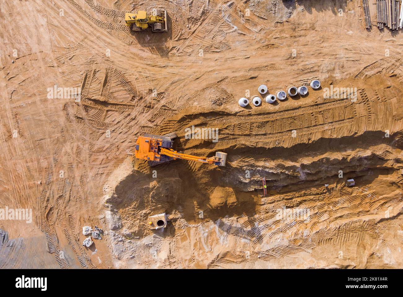 Excavators are digging trenches for sewer laying and connecting