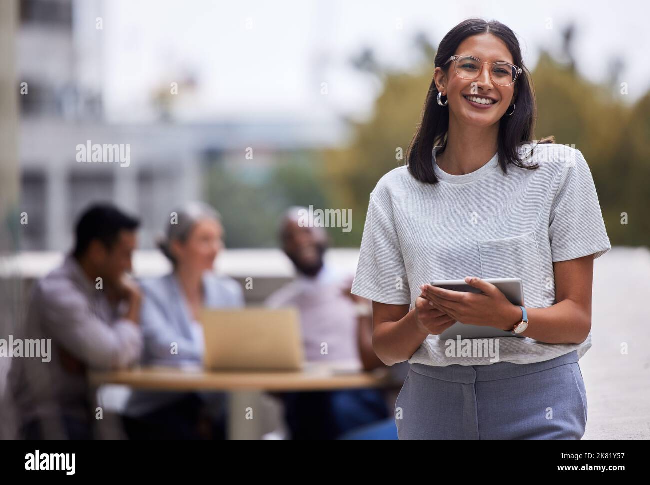 You only have to be right once to succeed. a young businesswoman standing outside the office. Stock Photo