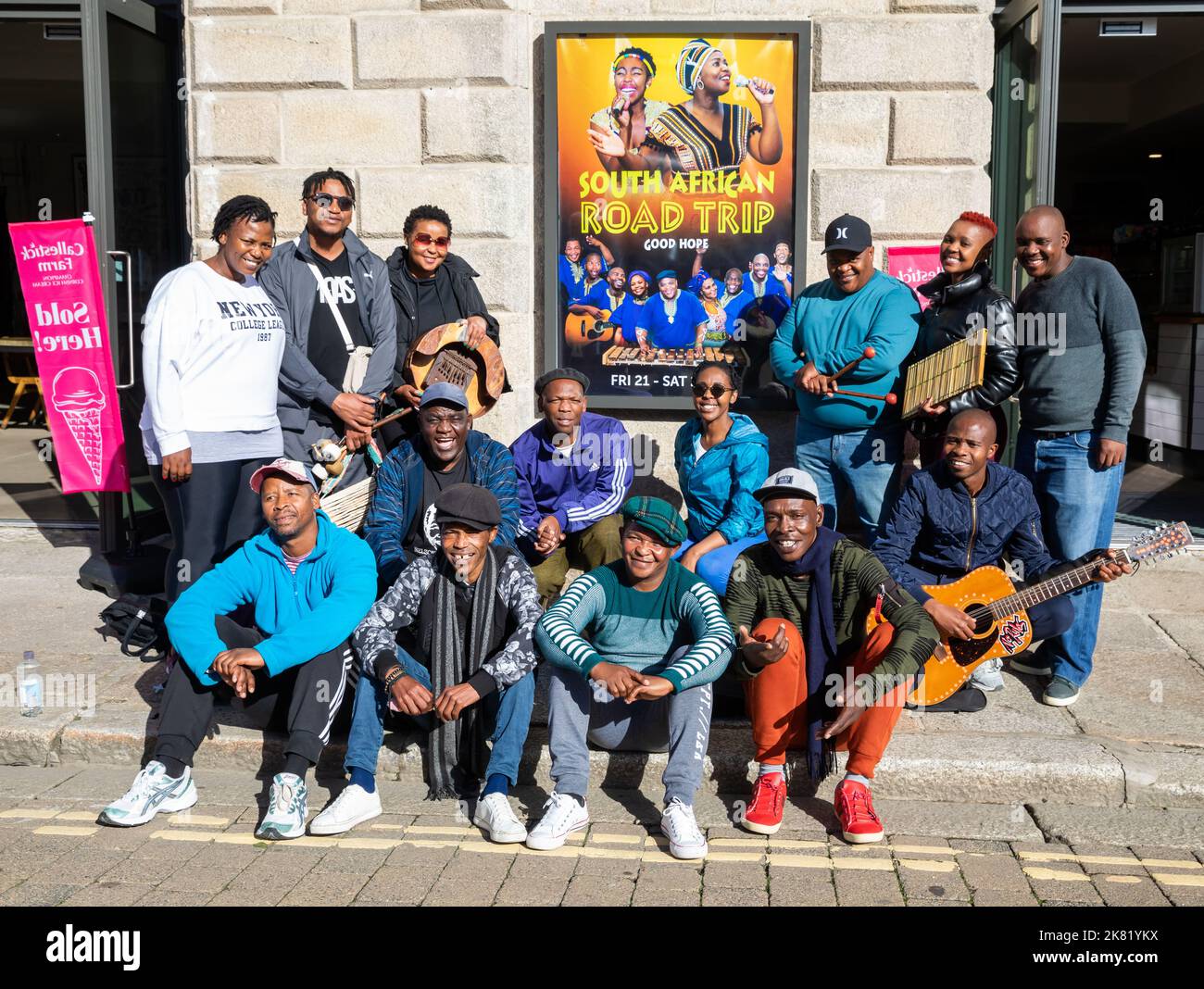 Truro, Cornwall,20th October 2022, The cast of a new show South African Road Trip’s ‘Good Hope’ posed for photos outside Hall for Cornwall theatre in Truro, Cornwall. The show premier's tomorrow and is on Friday & Saturday before moving to London. Presented by the accomplished men of the Khayelitsha United Mambazo Choir and four renowned female Xhosa singers, with musical accompaniment of two imposing South-African musicians.Credit: Keith Larby/Alamy Live News Stock Photo