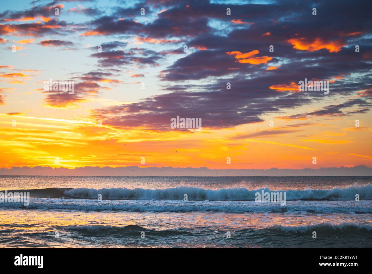 Beach sunrise over the tropical sea Stock Photo - Alamy