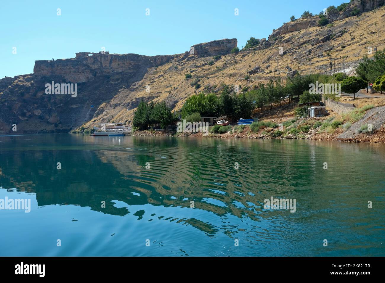 A view from the dam lake located in Eğil district of Diyarbakır province. Stock Photo