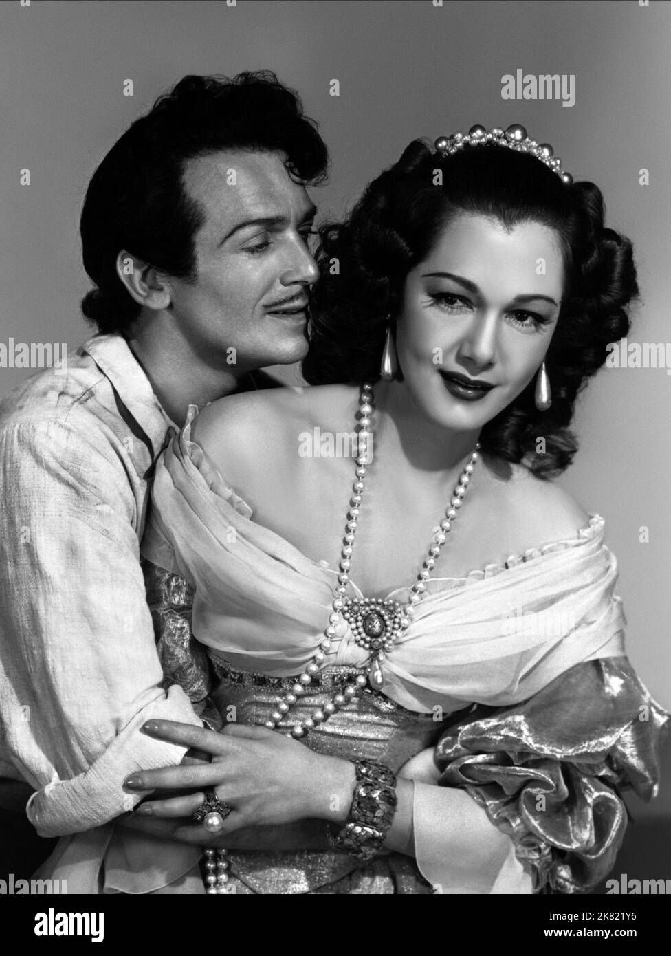 Douglas Fairbanks Jr. & Maria Montez Film: The Exile (USA 1947) Characters: Charles II Stuart, Countess  Director: Max Ophüls 17 October 1947   **WARNING** This Photograph is for editorial use only and is the copyright of UNIVERSAL PICTURES and/or the Photographer assigned by the Film or Production Company and can only be reproduced by publications in conjunction with the promotion of the above Film. A Mandatory Credit To UNIVERSAL PICTURES is required. The Photographer should also be credited when known. No commercial use can be granted without written authority from the Film Company. Stock Photo