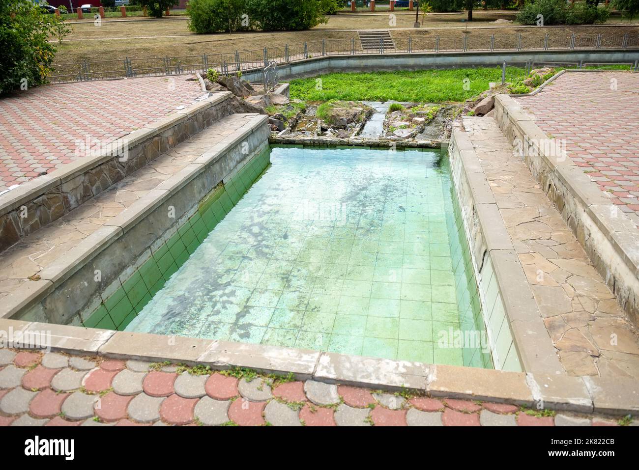 Open pool with spring water at the walls of the Zadonsky Nativity of ...