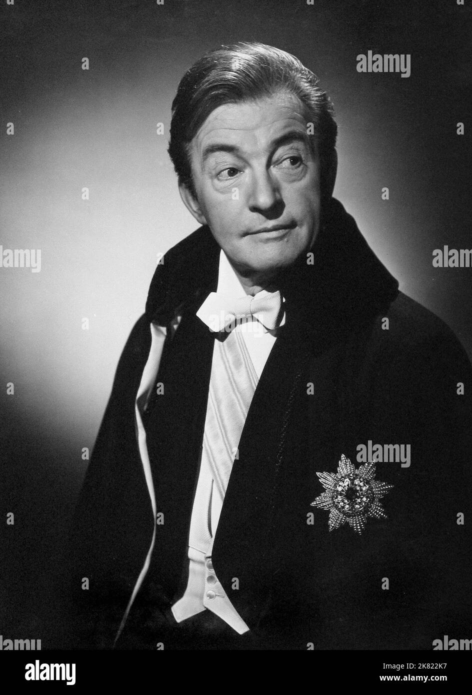 Claude Rains  Film The Passionate Friends (1946) Characters: Howard Justin  Director: David Lean 17 May 1949   **WARNING** This Photograph is for editorial use only and is the copyright of CINEGUILD and/or the Photographer assigned by the  Film or Production Company and can only be reproduced by publications in conjunction with the promotion of the above  Film. A Mandatory Credit To CINEGUILD is required. The Photographer should also be credited when known. No commercial use can be granted without written authority from the  Film Company. Stock Photo