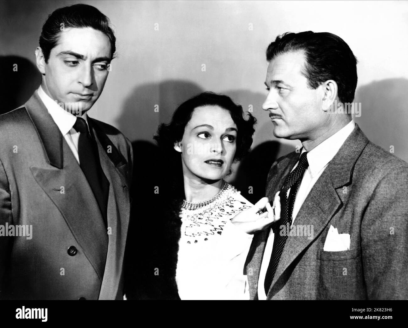 Stanley Waxman, Katherine Demille & Milburn Stone Film: The Judge; The Gamblers (1949) Characters: Dr. James Anderson,Lucille Strang & Martin Strang  Director: Elmer Clifton 31 January 1949   **WARNING** This Photograph is for editorial use only and is the copyright of EMERALD PRODUCTIONS and/or the Photographer assigned by the Film or Production Company and can only be reproduced by publications in conjunction with the promotion of the above Film. A Mandatory Credit To EMERALD PRODUCTIONS is required. The Photographer should also be credited when known. No commercial use can be granted withou Stock Photo