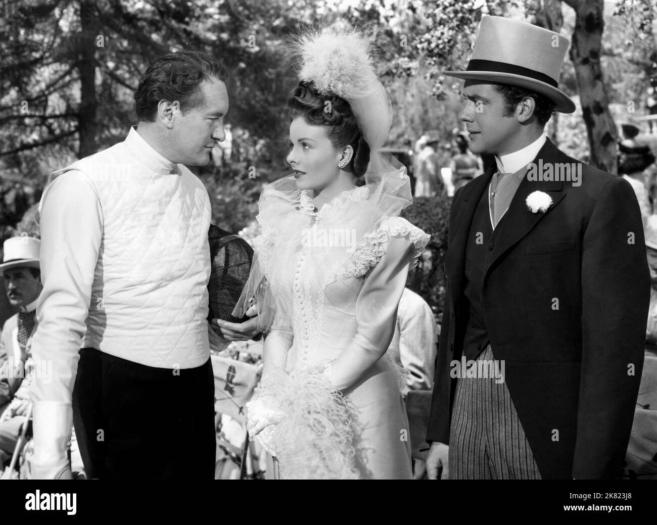 George Sanders, Jeanne Crain & Richard Greene Film: The Fan (1940) Characters: Lord Robert Darlington,Lady Margaret 'Meg' Windermere & Lord Arthur Windermere  Director: Otto Preminger 01 April 1949   **WARNING** This Photograph is for editorial use only and is the copyright of 20TH CENTURY FOX and/or the Photographer assigned by the Film or Production Company and can only be reproduced by publications in conjunction with the promotion of the above Film. A Mandatory Credit To 20TH CENTURY FOX is required. The Photographer should also be credited when known. No commercial use can be granted with Stock Photo