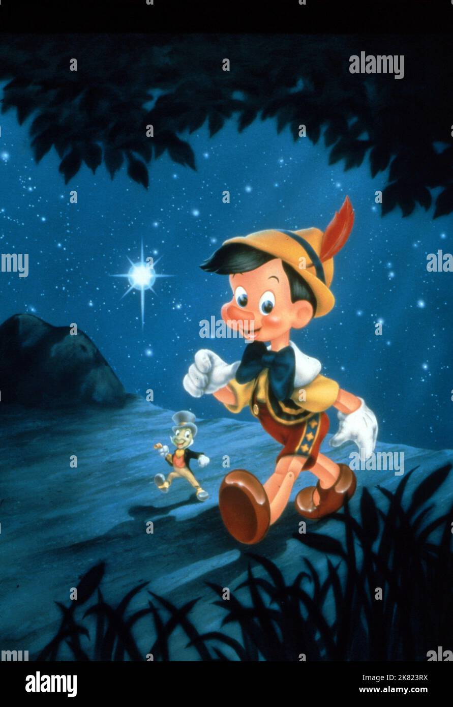 Jiminy Cricket & Pinocchio Film: Pinocchio (USA 1940)   Director: Hamilton Luske, Ben Shapsteen 07 February 1940   **WARNING** This Photograph is for editorial use only and is the copyright of DISNEY and/or the Photographer assigned by the Film or Production Company and can only be reproduced by publications in conjunction with the promotion of the above Film. A Mandatory Credit To DISNEY is required. The Photographer should also be credited when known. No commercial use can be granted without written authority from the Film Company. Stock Photo