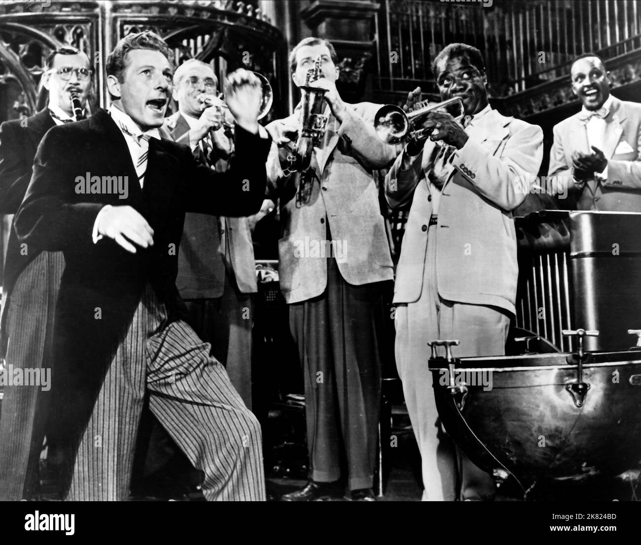 Danny Kaye, Benny Goodman, Tommy Dorsey, Charlie Barnet & Louis Armstrong Film: A Song Is Born (1948) Characters: Professor Hobart Frisbee, Professor Magenbruch, Himself, Himself, Himself  Director: Howard Hawks 19 October 1948   **WARNING** This Photograph is for editorial use only and is the copyright of The Film Company and/or the Photographer assigned by the Film or Production Company and can only be reproduced by publications in conjunction with the promotion of the above Film. A Mandatory Credit To The Film Company is required. The Photographer should also be credited when known. No comm Stock Photo