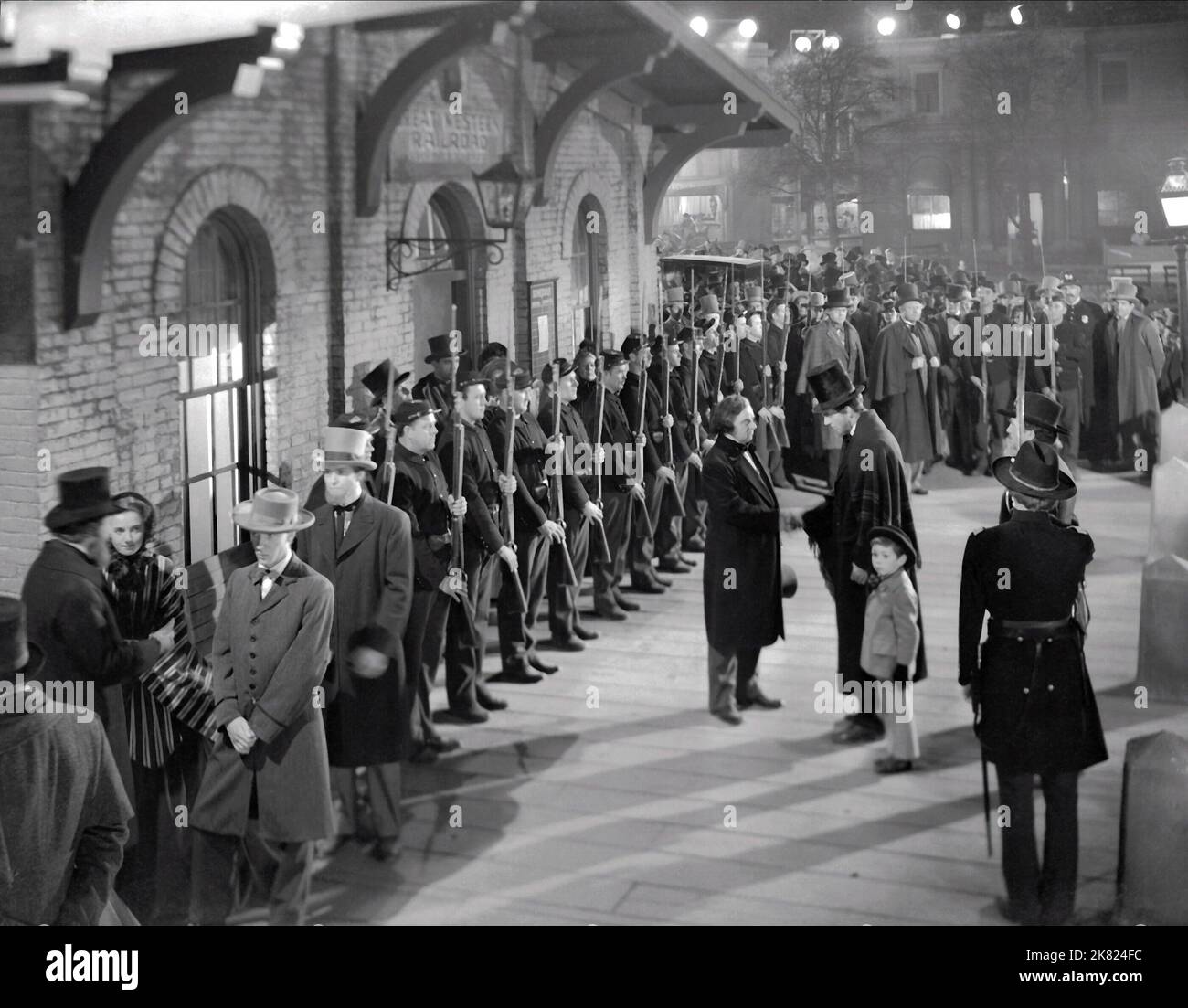 Raymond Massey & Henry Blair Film: Abe Lincoln In Illinois (USA 1940) Characters: Abraham Lincoln, Tad Lincoln / Nach Dem Bühnenstück "Abraham Lincoln In Illinois" Director: John Cromwell 22 January 1940 **WARNING** This Photograph is for editorial use only and is the copyright of RKO PICTURES and/or the Photographer assigned by the Film or Production Company and can only be reproduced by publications in conjunction with the promotion of the above Film. A Mandatory Credit To RKO PICTURES is required. The Photographer should also be credited when known. No commercial use can be granted witho Stock Photo