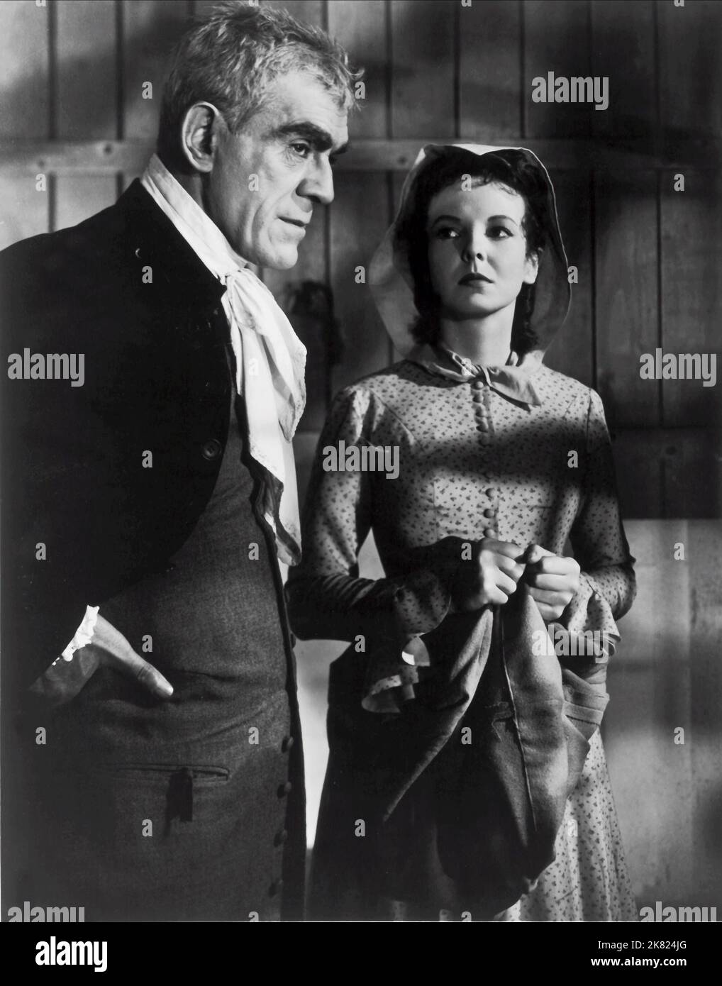 Boris Karloff & Anna Lee  Film Bedlam (1946) Characters: Master George Sims, Nell Bowen  Director: Mark Robson 10 May 1946   **WARNING** This Photograph is for editorial use only and is the copyright of RKO RADIO PICTURES and/or the Photographer assigned by the  Film or Production Company and can only be reproduced by publications in conjunction with the promotion of the above  Film. A Mandatory Credit To RKO RADIO PICTURES is required. The Photographer should also be credited when known. No commercial use can be granted without written authority from the  Film Company. Stock Photo