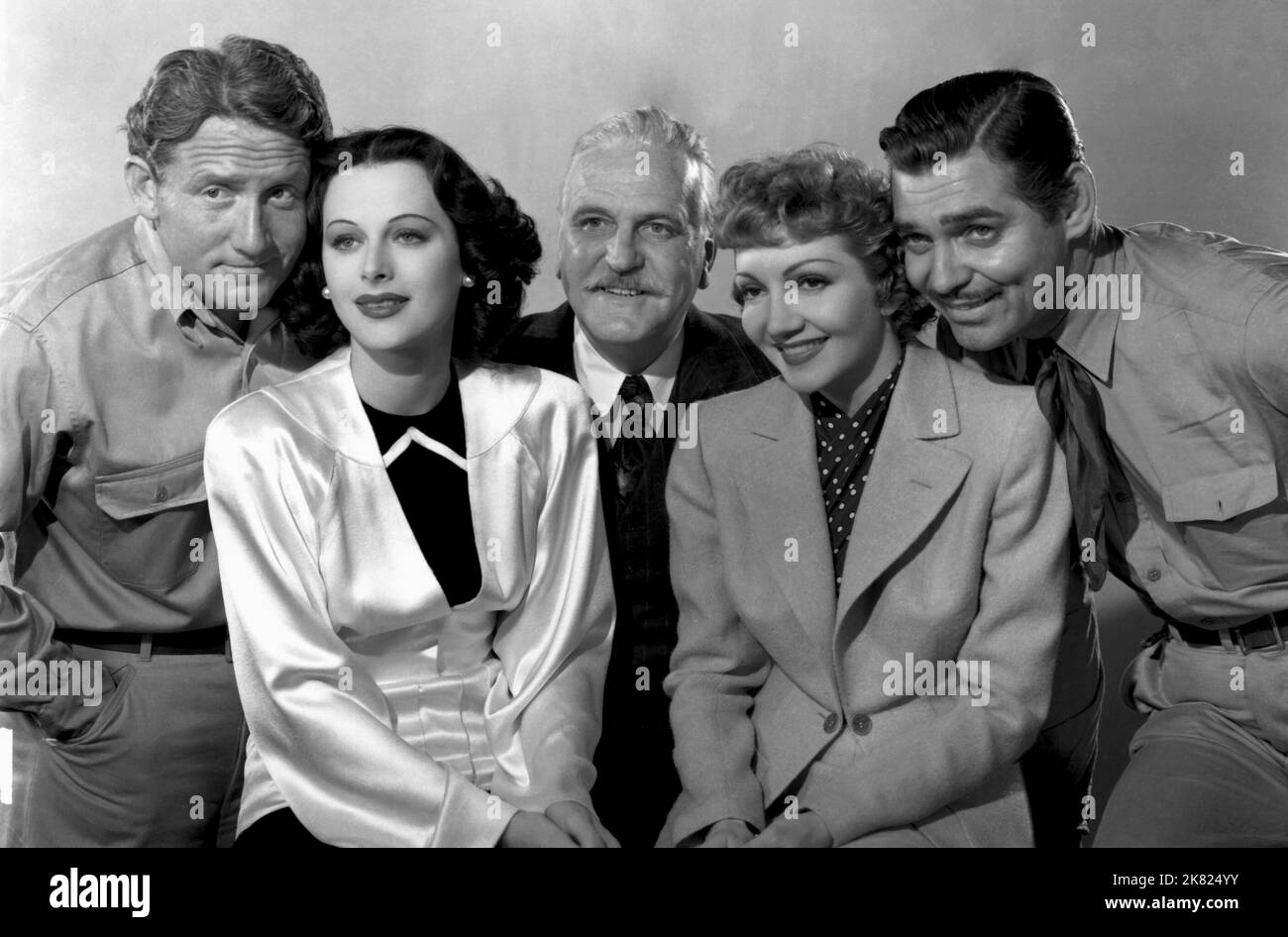 Spencer Tracy, Hedy Lamarr, Frank Morgan, Claudette Colbert & Clark Gable Film: Boom Town (USA 1940) Characters: Jonathan Sand, Karen Vanmeer, Luther Aldrich, Elizabeth Bartlett McMasters, Big John McMasters  Director: Jack Conway 30 August 1940   **WARNING** This Photograph is for editorial use only and is the copyright of MGM and/or the Photographer assigned by the Film or Production Company and can only be reproduced by publications in conjunction with the promotion of the above Film. A Mandatory Credit To MGM is required. The Photographer should also be credited when known. No commercial u Stock Photo