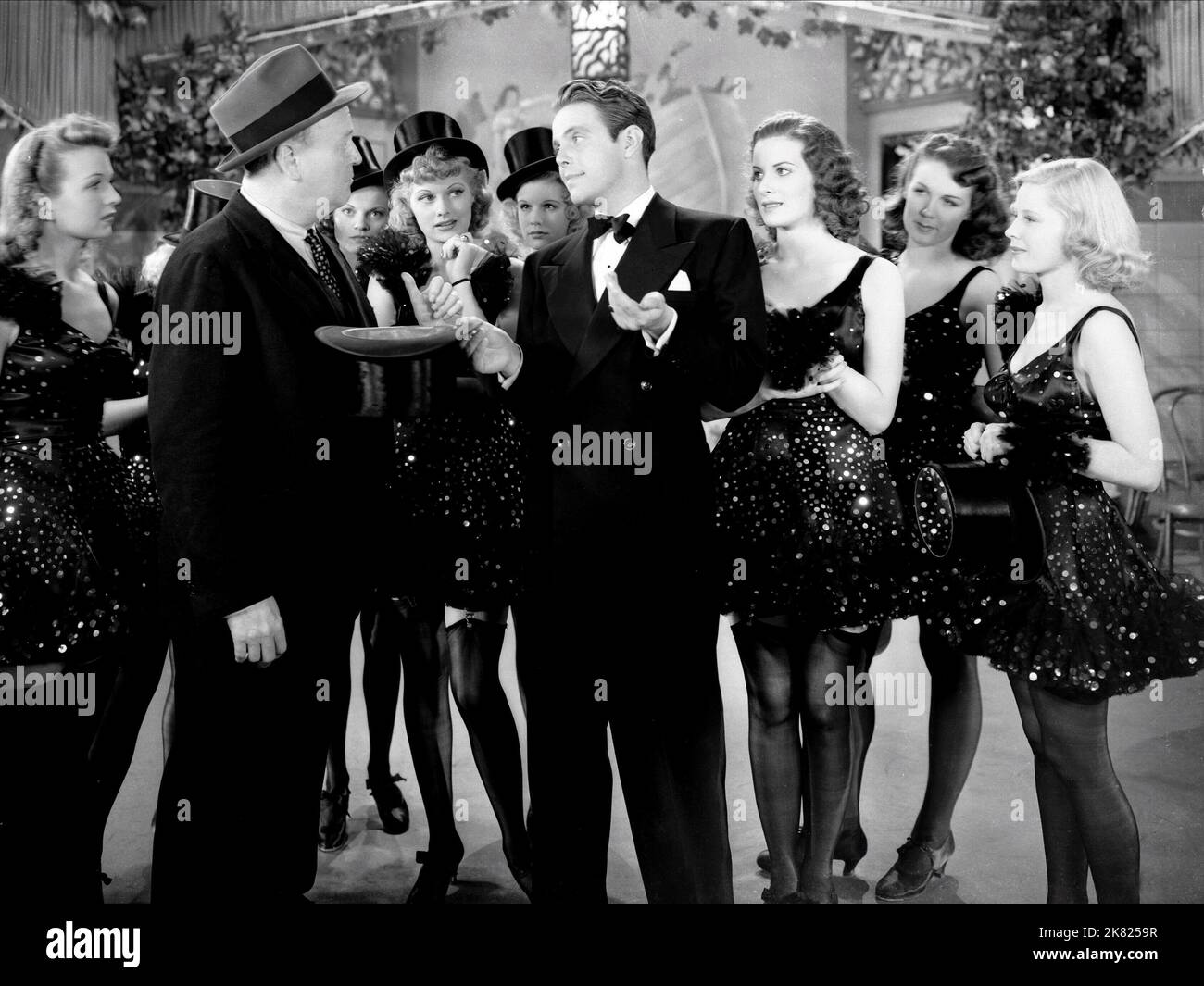 Louis Hayward, Lucille Ball, Maureen O'Hara & Mary Carlisle Film: Dance, Girl, Dance (USA 1940) Characters: Jimmy Harris, Bubbles, Judy O'Brien, Sally  Director: Dorothy Arzner 30 August 1940   **WARNING** This Photograph is for editorial use only and is the copyright of RKO and/or the Photographer assigned by the Film or Production Company and can only be reproduced by publications in conjunction with the promotion of the above Film. A Mandatory Credit To RKO is required. The Photographer should also be credited when known. No commercial use can be granted without written authority from the F Stock Photo