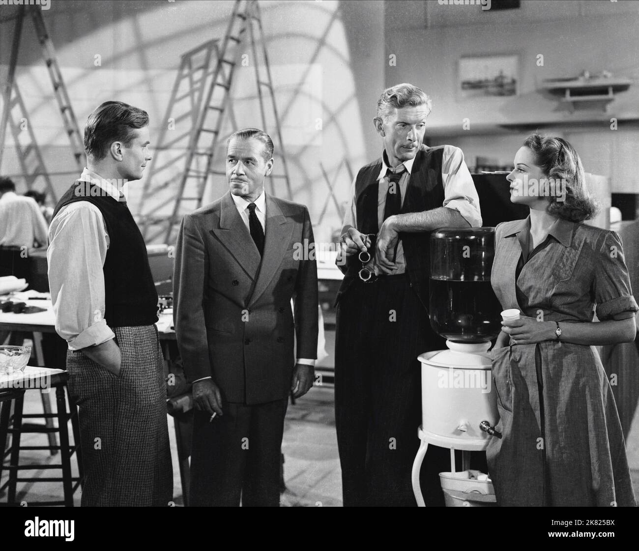 Kent Smith, Jack Holt, Alan Napier & Jane Randolph Film: Cat People (USA 1942) Characters: Oliver Reed, The Commodore, Doc Carver (uncredited), Alice Moore  Director: Jacques Tourneur 06 December 1942   **WARNING** This Photograph is for editorial use only and is the copyright of RKO and/or the Photographer assigned by the Film or Production Company and can only be reproduced by publications in conjunction with the promotion of the above Film. A Mandatory Credit To RKO is required. The Photographer should also be credited when known. No commercial use can be granted without written authority f Stock Photo