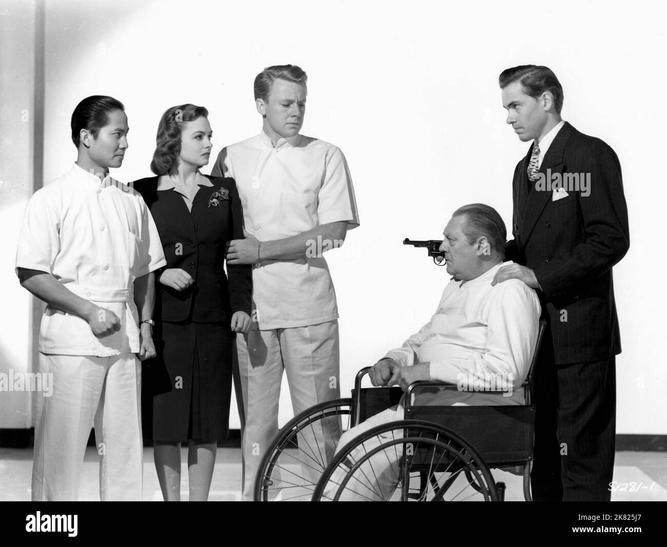 Keye Luke, Donna Reed, Van Johnson, Lionel Barrymore & John Craven Film: Dr. Gillespie'S Criminal Case (1943) Characters: Keye Luke, Marcia Bradburn, DrRandall Adams, Lionel Barrymore, Roy Todwell  Director: Willis Goldbeck 08 May 1943   **WARNING** This Photograph is for editorial use only and is the copyright of MGM and/or the Photographer assigned by the Film or Production Company and can only be reproduced by publications in conjunction with the promotion of the above Film. A Mandatory Credit To MGM is required. The Photographer should also be credited when known. No commercial use can be Stock Photo