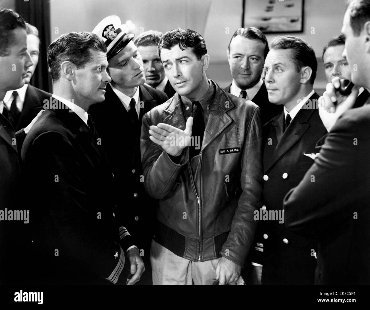 Robert Taylor Film: Flight Command (1940) Characters: Ensign Alan Drake  Director: Frank Borzage 17 December 1940   **WARNING** This Photograph is for editorial use only and is the copyright of MGM and/or the Photographer assigned by the Film or Production Company and can only be reproduced by publications in conjunction with the promotion of the above Film. A Mandatory Credit To MGM is required. The Photographer should also be credited when known. No commercial use can be granted without written authority from the Film Company. Stock Photo