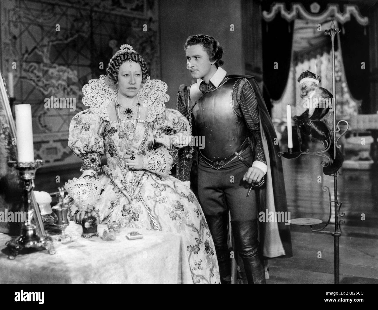Flora Robson & Errol Flynn Film: The Sea Hawk (1941) Characters: Queen Elizabeth & Geoffrey Thorpe  Director: Michael Curtiz 01 July 1940   **WARNING** This Photograph is for editorial use only and is the copyright of WARNER BROS and/or the Photographer assigned by the Film or Production Company and can only be reproduced by publications in conjunction with the promotion of the above Film. A Mandatory Credit To WARNER BROS is required. The Photographer should also be credited when known. No commercial use can be granted without written authority from the Film Company. Stock Photo