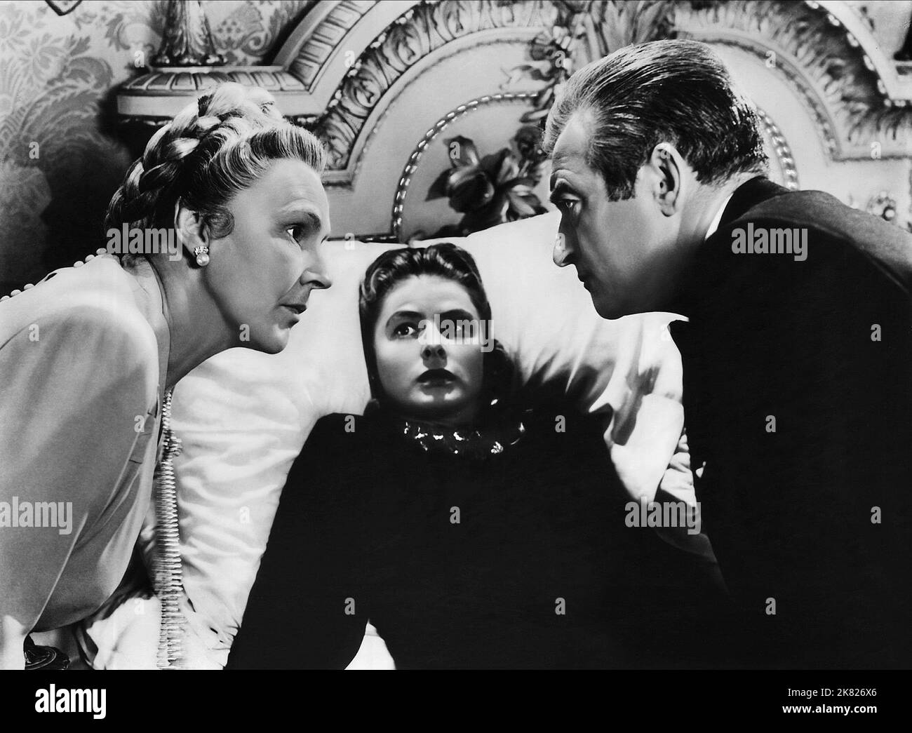 Leopoldine Konstantin, Ingrid Bergman, Claude Rains Film: Notorious (USA 1964) Characters: Madame Anna Sebastian,Alicia Huberman,Alexander Sebastian  Director: Alfred Hitchcock 15 August 1946   **WARNING** This Photograph is for editorial use only and is the copyright of RKO and/or the Photographer assigned by the Film or Production Company and can only be reproduced by publications in conjunction with the promotion of the above Film. A Mandatory Credit To RKO is required. The Photographer should also be credited when known. No commercial use can be granted without written authority from the F Stock Photo