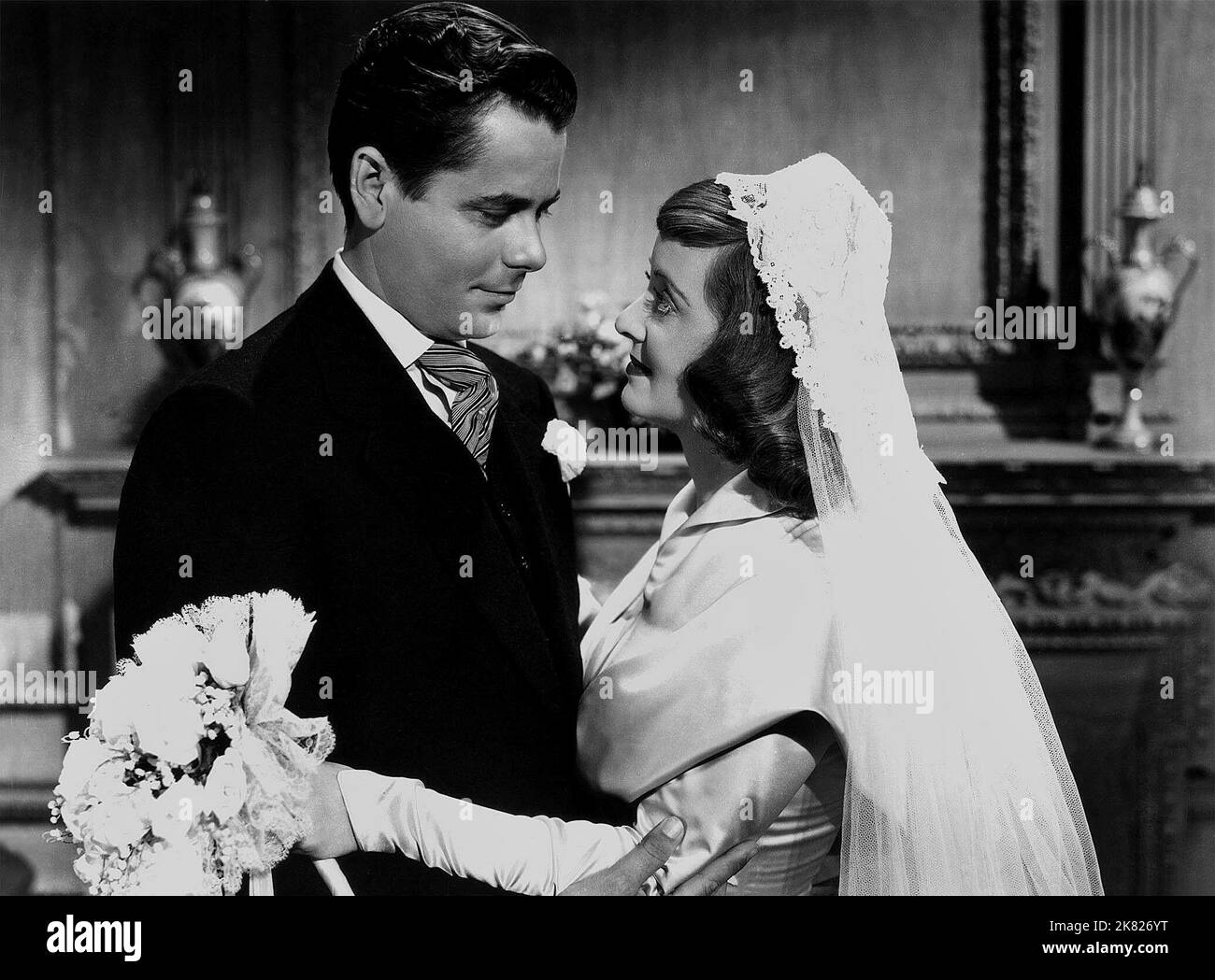 Glenn Ford & Bette Davis Film: A Stolen Life (1947) Characters: Bill Emerson & Kate Bosworth / Patricia Bosworth  Director: Curtis Bernhardt 06 July 1946   **WARNING** This Photograph is for editorial use only and is the copyright of WARNER BROS and/or the Photographer assigned by the Film or Production Company and can only be reproduced by publications in conjunction with the promotion of the above Film. A Mandatory Credit To WARNER BROS is required. The Photographer should also be credited when known. No commercial use can be granted without written authority from the Film Company. Stock Photo