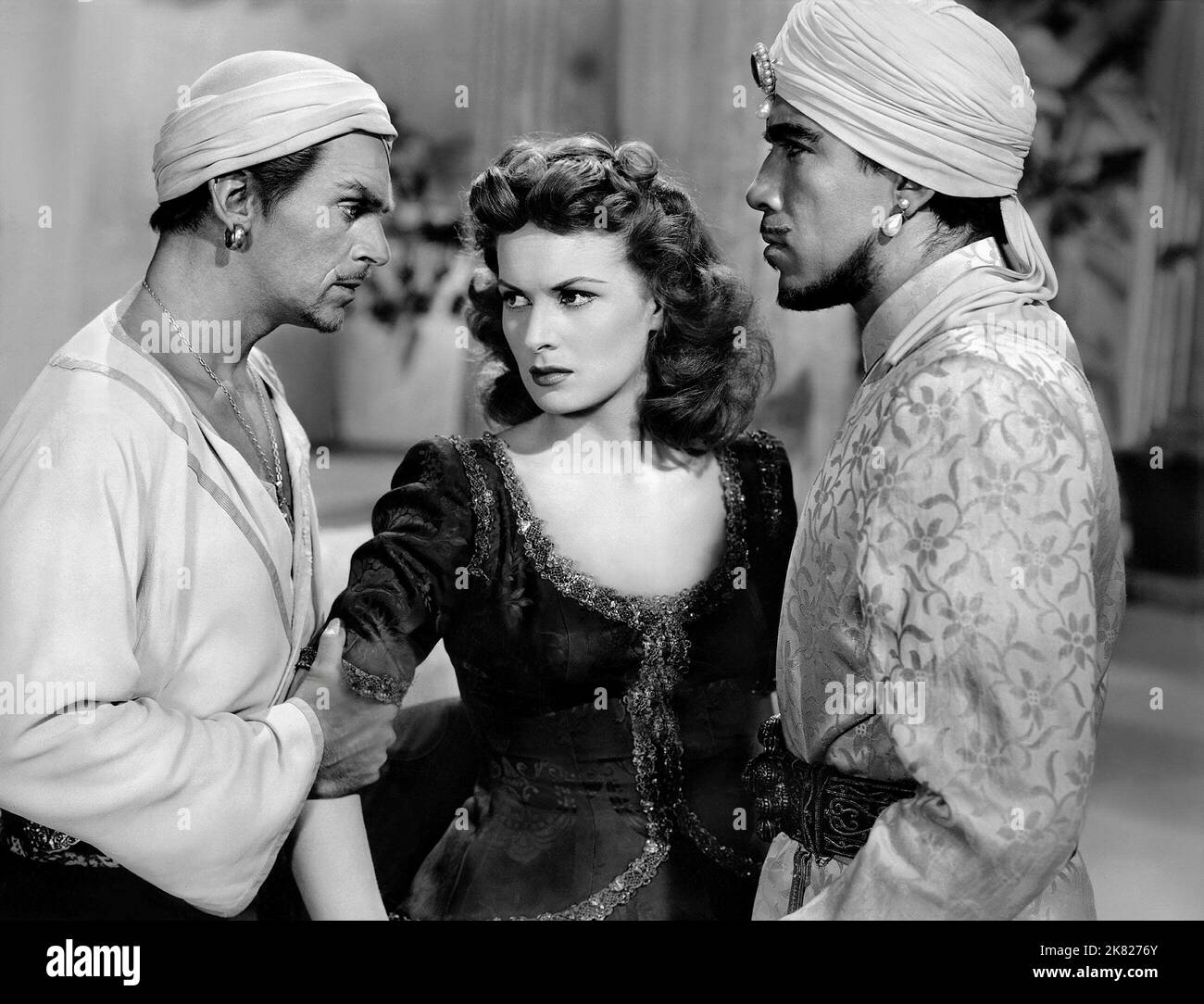 Douglas Fairbanks Jnr, Maureen O'Hara & Anthony Quinn Film: Sinbad The Sailor; Sinbad, The Sailor (USA 1947) Characters: ,,Emir  / Woman Between Two Men Director: Richard Wallace 13 January 1947   **WARNING** This Photograph is for editorial use only and is the copyright of RKO and/or the Photographer assigned by the Film or Production Company and can only be reproduced by publications in conjunction with the promotion of the above Film. A Mandatory Credit To RKO is required. The Photographer should also be credited when known. No commercial use can be granted without written authority from th Stock Photo