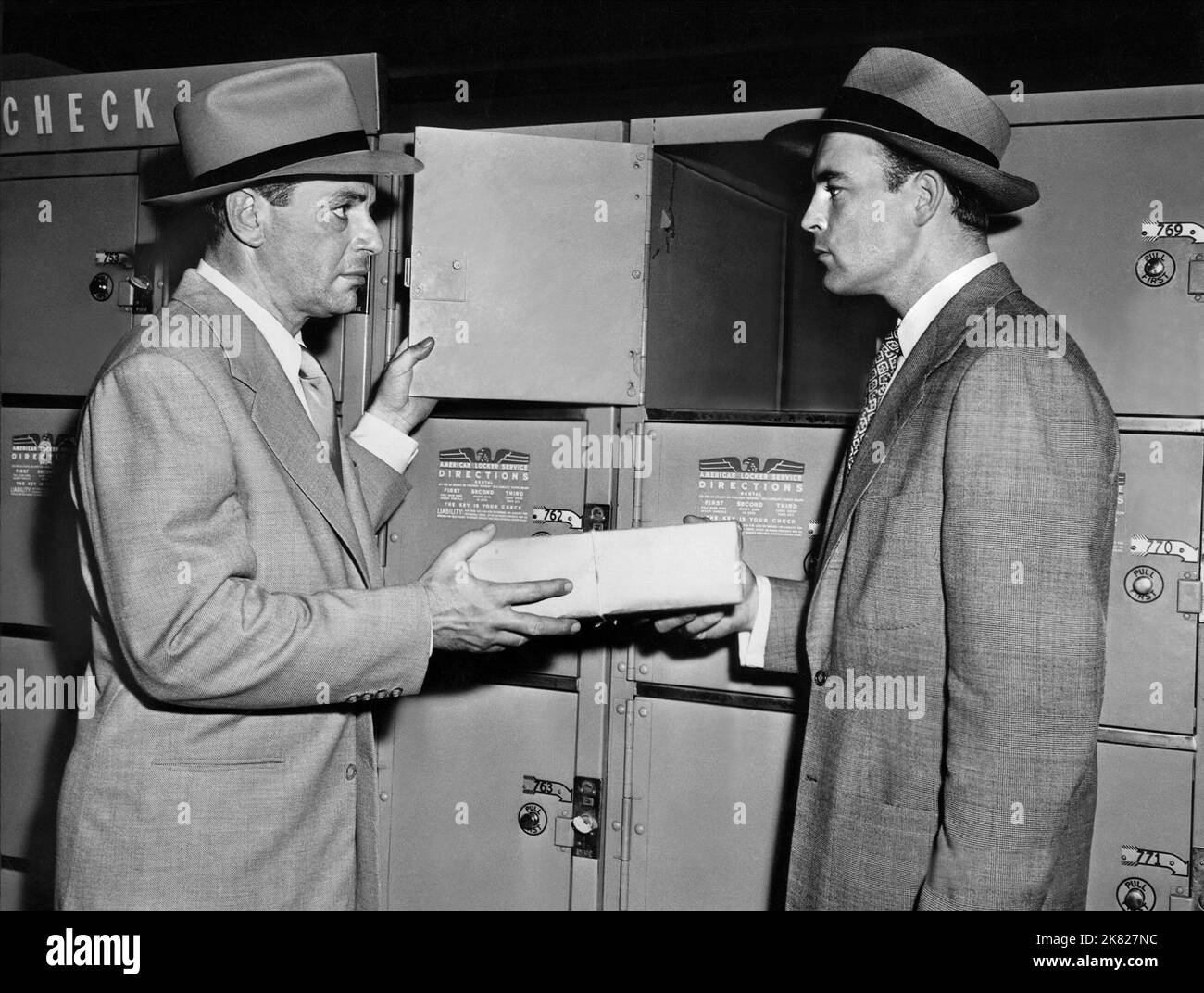 Richard Rober & Scott Brady Film: Port Of New York (1949) Characters: Jim Flannery & Michael 'Mickey' Waters  Director: Laslo Benedek 28 November 1949   **WARNING** This Photograph is for editorial use only and is the copyright of EAGLE-LION and/or the Photographer assigned by the Film or Production Company and can only be reproduced by publications in conjunction with the promotion of the above Film. A Mandatory Credit To EAGLE-LION is required. The Photographer should also be credited when known. No commercial use can be granted without written authority from the Film Company. Stock Photo