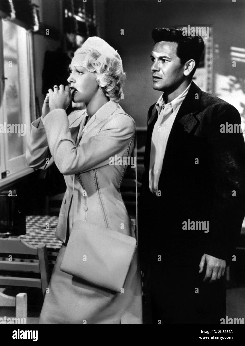 Lana Turner & John Garfield Film: The Postman Always Rings Twice (USA 1946) Characters: Cora Smith, Frank Chambers  / Titel Auch: 'Die Rechnung Ohne Den Wirt' Director: Tay Garnett 02 May 1946   **WARNING** This Photograph is for editorial use only and is the copyright of MGM and/or the Photographer assigned by the Film or Production Company and can only be reproduced by publications in conjunction with the promotion of the above Film. A Mandatory Credit To MGM is required. The Photographer should also be credited when known. No commercial use can be granted without written authority from the Stock Photo