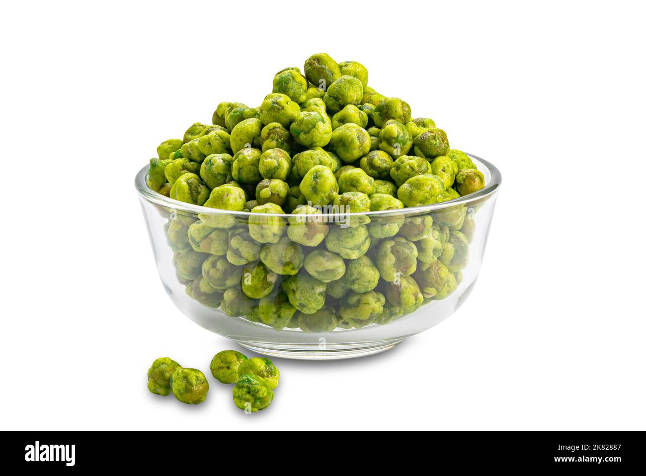 Closeup view pile of dried crispy spicy wasabi coated green peas in