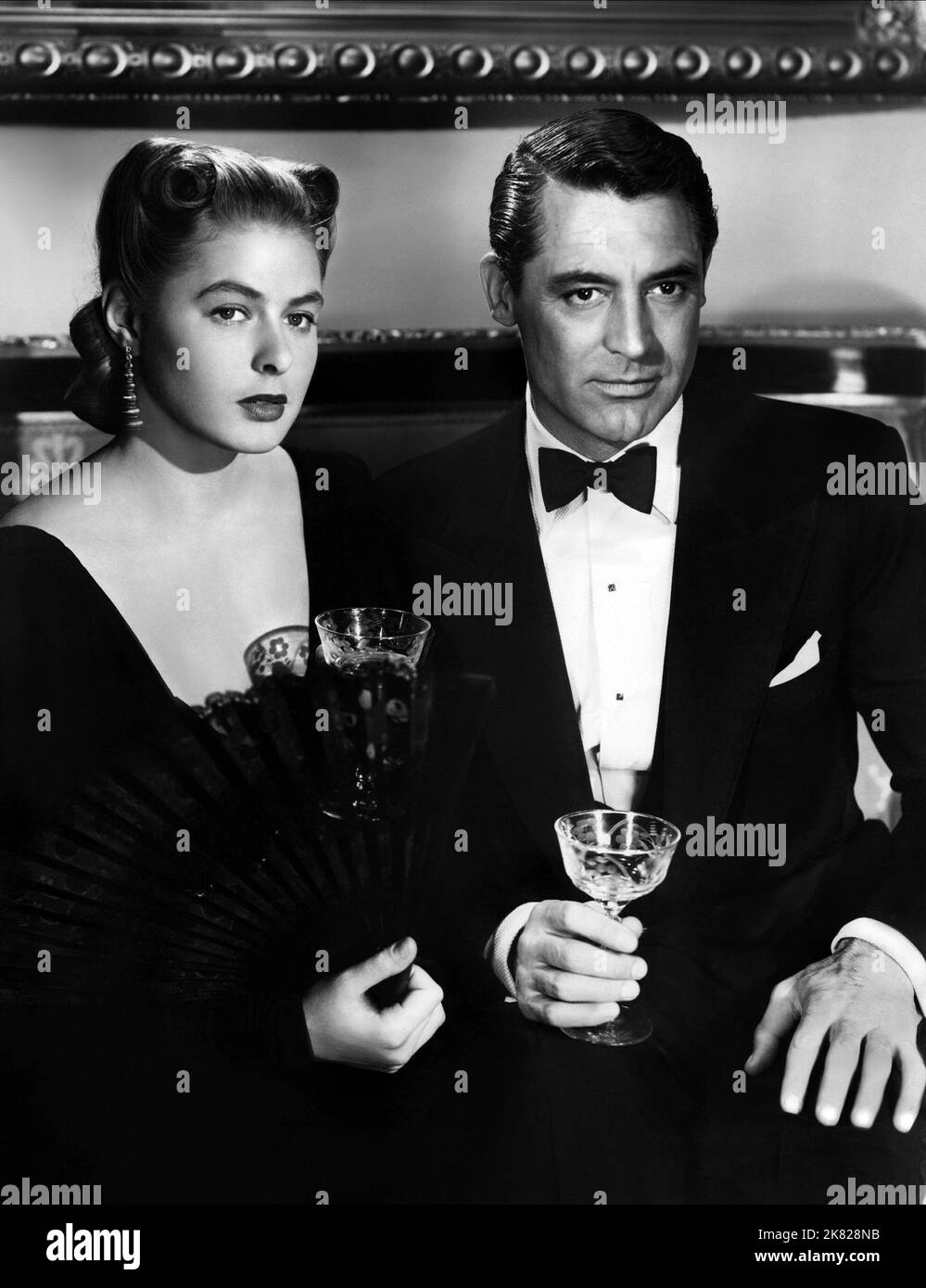 Ingrid Bergman & Cary Grant Film: Notorious (USA 1964) Characters: Alicia Huberman, T.R. Devlin  Director: Alfred Hitchcock 15 August 1946   **WARNING** This Photograph is for editorial use only and is the copyright of RKO and/or the Photographer assigned by the Film or Production Company and can only be reproduced by publications in conjunction with the promotion of the above Film. A Mandatory Credit To RKO is required. The Photographer should also be credited when known. No commercial use can be granted without written authority from the Film Company. Stock Photo