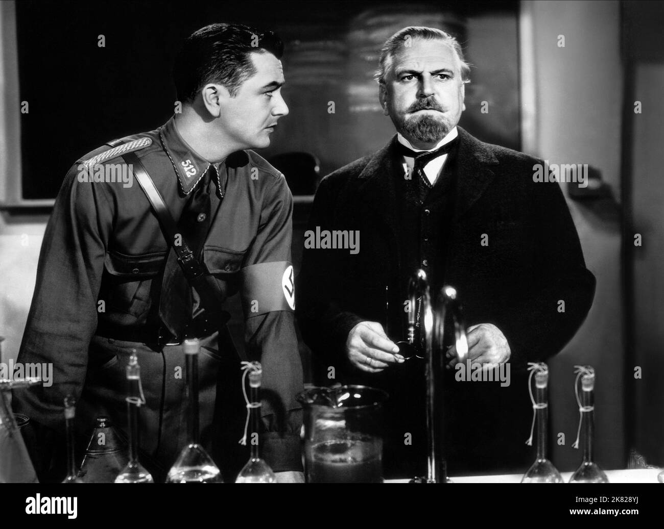 Robert Young & Frank Morgan Film: The Mortal Storm (1940) Characters: Fritz Marberg, Prof. Viktor Roth  Director: Frank Borzage 14 June 1940   **WARNING** This Photograph is for editorial use only and is the copyright of MGM and/or the Photographer assigned by the Film or Production Company and can only be reproduced by publications in conjunction with the promotion of the above Film. A Mandatory Credit To MGM is required. The Photographer should also be credited when known. No commercial use can be granted without written authority from the Film Company. Stock Photo