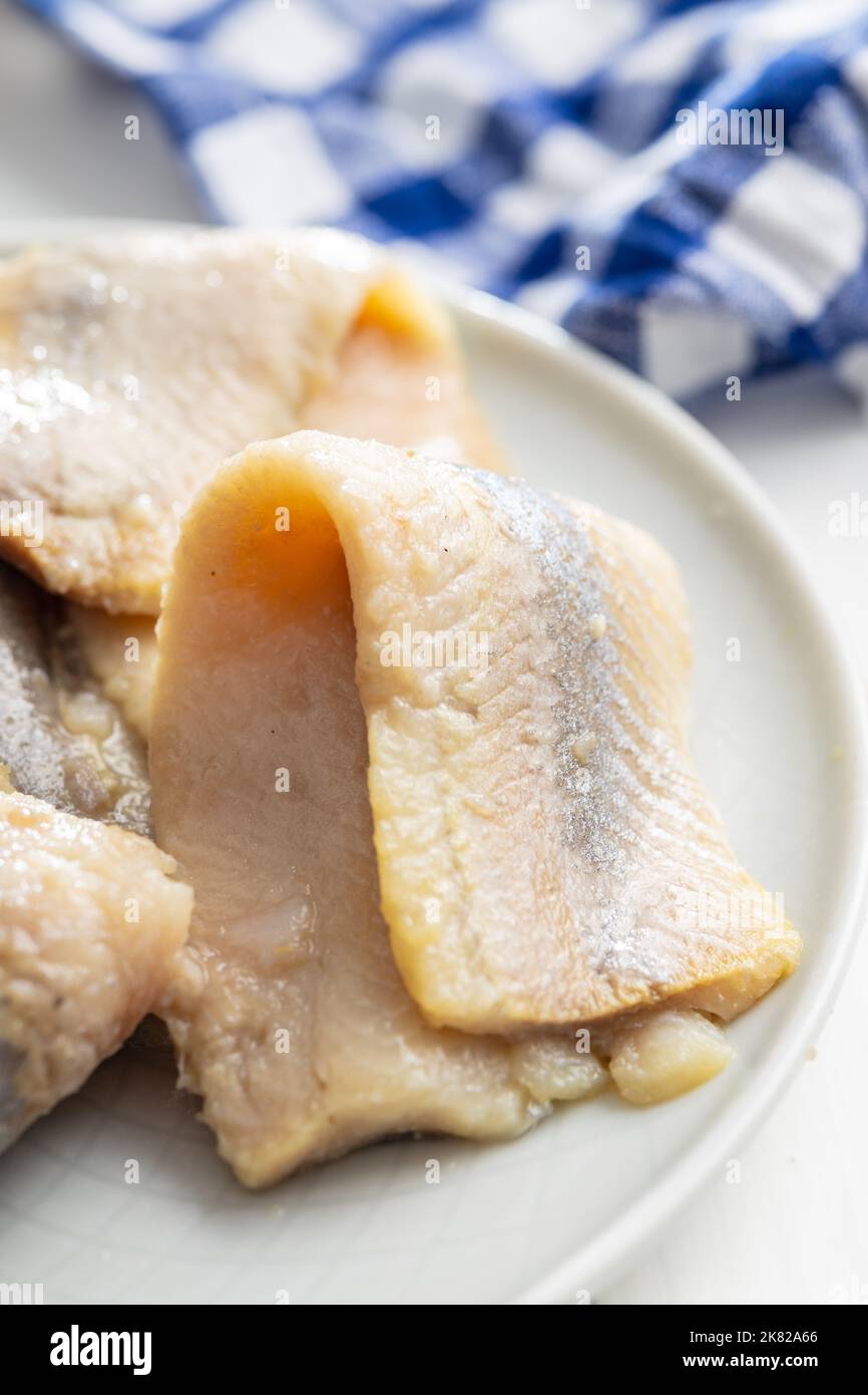 Marinated herring fish on the plate Stock Photo - Alamy