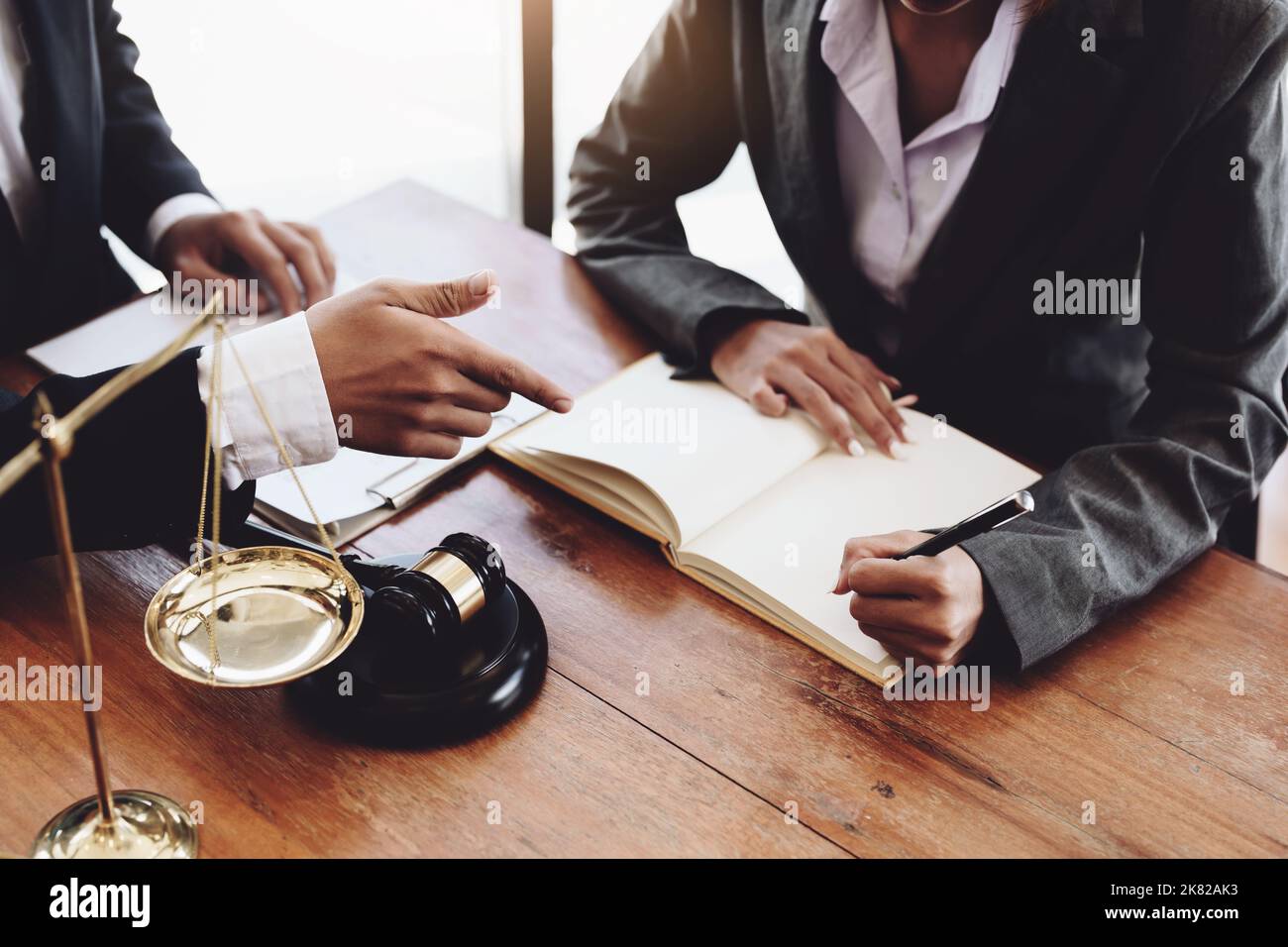The client is consulting with a lawyer on legal matters Stock Photo Alamy
