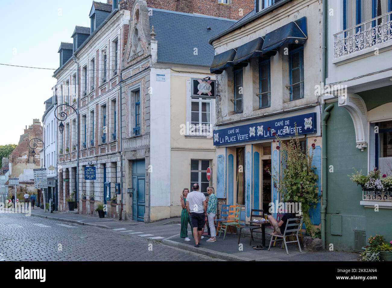 Street scene including Cafe de la Place Verte on Rue Pierre Ledent, Montreuil sur Mer, France Stock Photo